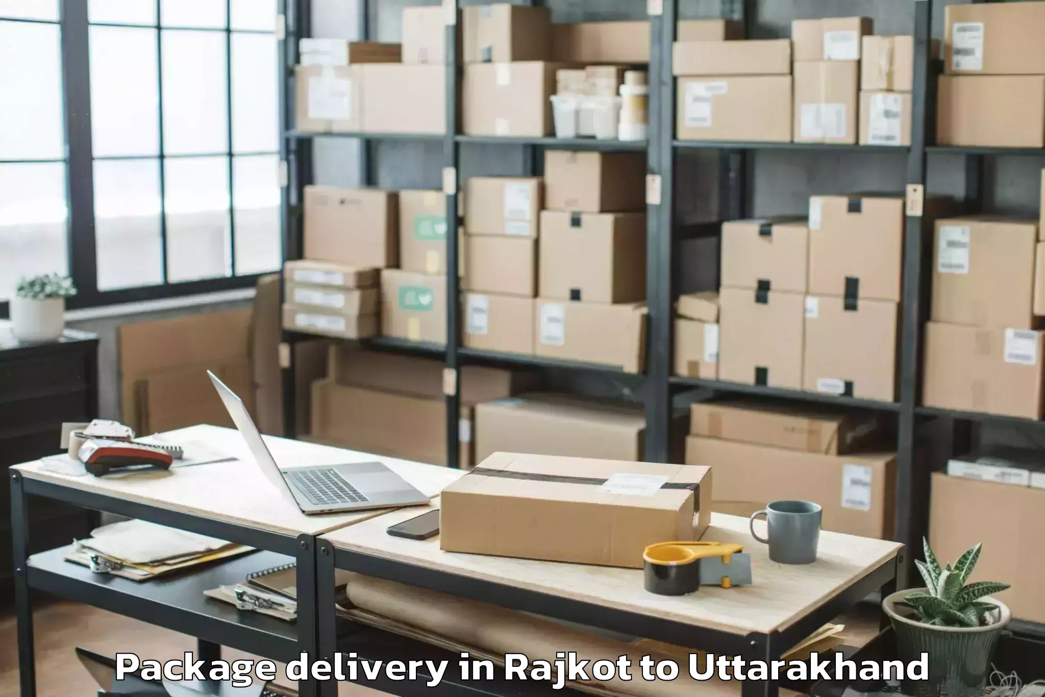 Get Rajkot to Uttaranchal University Dehradu Package Delivery